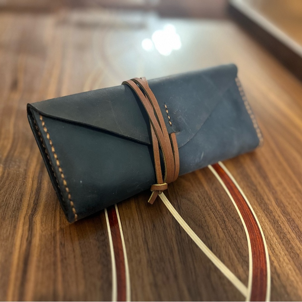 Small handmade leather clutch